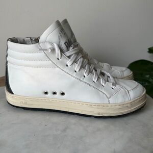 P448 Skate High Top white Leather Shoes
Women’s size 39 fits 8.5-9US